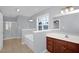 Bright bathroom featuring a tub, separate shower, double sinks, and a large mirror at 32 Lattimore Rd, Cameron, NC 28326