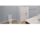 Well-lit bathroom with a combination shower and tub, toilet, and tile flooring at 32 Lattimore Rd, Cameron, NC 28326