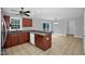 Updated kitchen featuring granite countertops, stainless steel appliances, and tiled flooring at 32 Lattimore Rd, Cameron, NC 28326