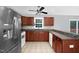 Updated kitchen featuring granite countertops, stainless steel appliances, and tiled backsplash at 32 Lattimore Rd, Cameron, NC 28326