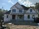 Unfinished construction with a focus on energy efficient windows and insulation to lower home energy costs at 34 Cloudview Ct, Pittsboro, NC 27312