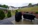 Backyard boasts patio, and landscaped hill at 3848 Griffis Glen Dr, Raleigh, NC 27610
