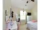 Bedroom includes a white desk, white dresser, and pink decorations at 3848 Griffis Glen Dr, Raleigh, NC 27610
