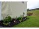 Well-maintained landscaping with lush greenery and decorative elements, adding curb appeal and charm to the property at 3848 Griffis Glen Dr, Raleigh, NC 27610