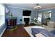 Spacious living room with modern decor, fireplace, and abundant natural light at 3848 Griffis Glen Dr, Raleigh, NC 27610