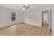 Bedroom with natural light, ceiling fan, and laminate flooring at 397 Meadow Rd, Kenly, NC 27542