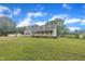 A charming home with lush greenery, a large yard, and inviting curb appeal at 397 Meadow Rd, Kenly, NC 27542