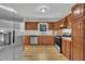 Spacious kitchen with stainless steel appliances, wood cabinets and ample countertop space at 397 Meadow Rd, Kenly, NC 27542