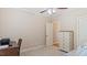 Spacious bedroom featuring a writing desk, storage cabinet, and neutral walls at 422 River Ridge Ln, Timberlake, NC 27583