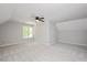 Spacious bedroom featuring a ceiling fan, neutral paint, and carpet flooring at 50 Peggy Ct, Raleigh, NC 27603