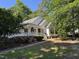 Charming single-Gathering home featuring a welcoming porch and landscaped front yard at 50 Peggy Ct, Raleigh, NC 27603