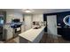 Kitchen featuring white cabinets, stainless steel appliances, and a bright and airy atmosphere at 50 Peggy Ct, Raleigh, NC 27603