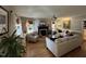 Spacious living room offering hardwood floors, a fireplace, and ample seating options at 50 Peggy Ct, Raleigh, NC 27603