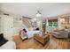 Cozy living room with hardwood floors, a comfortable sofa, and stylish furnishings at 50 Peggy Ct, Raleigh, NC 27603