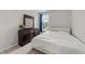 Bright bedroom featuring a bed, dresser with mirror and a window at 5104 Windmere Chase Dr, Raleigh, NC 27616