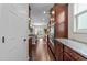 Spacious kitchen featuring granite counters, wood cabinets, hardwood floors and stainless appliances at 5104 Windmere Chase Dr, Raleigh, NC 27616