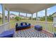 Comfortable screened porch with seating and outdoor views, perfect for relaxation and entertaining at 5104 Windmere Chase Dr, Raleigh, NC 27616