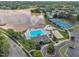 Aerial view showcases community pool, tennis courts, and lake, offering scenic recreational opportunities at 522 Crossview Ln, Durham, NC 27703
