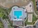 Aerial of the community pool with sand volleyball court, playground, and lake access at 522 Crossview Ln, Durham, NC 27703