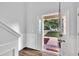 Bright entryway with wood floors showcases the front door and exterior view at 522 Crossview Ln, Durham, NC 27703