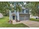 Lovely two-story home with a two-car garage, beautiful landscaping and attractive curb appeal at 522 Crossview Ln, Durham, NC 27703