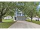 Beautiful two-story home with a two-car garage and mature trees offering shade and curb appeal at 522 Crossview Ln, Durham, NC 27703