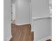A view down a well-lit hallway shows luxury vinyl flooring at 522 Crossview Ln, Durham, NC 27703