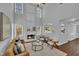 Bright and open living room features a fireplace, high ceilings, and plenty of natural light at 522 Crossview Ln, Durham, NC 27703