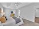 A view of the main bedroom features neutral decor, a sitting area, and ensuite access at 522 Crossview Ln, Durham, NC 27703