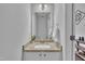 Elegant powder room featuring granite countertops and modern fixtures at 522 Crossview Ln, Durham, NC 27703