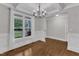 Dining area with hardwood floors, coffered ceilings, a chandelier, and natural light at 5412 Robbins Dr, Raleigh, NC 27610