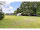 A large backyard offers plenty of space for outdoor activities at 59 Troy Dr, Fuquay Varina, NC 27526