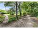 An expansive yard with trees that provides lots of privacy at 59 Troy Dr, Fuquay Varina, NC 27526