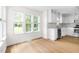 Bright breakfast nook with lots of natural light and an open view into the kitchen at 59 Troy Dr, Fuquay Varina, NC 27526