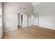 Bright living room boasts wood floors and high ceilings, offering a modern and airy feel to the home at 59 Troy Dr, Fuquay Varina, NC 27526
