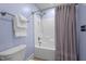 Functional bathroom with a shower-tub combination, a gray shower curtain, and a toilet, providing essential amenities at 5916 Two Pines Trl, Wake Forest, NC 27587