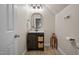Bathroom features a wood vanity with stylish fixtures, adding a touch of rustic charm at 5916 Two Pines Trl, Wake Forest, NC 27587