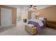 Inviting bedroom with a soft color palette, a comfortable bed, and natural light, creating a tranquil and relaxing atmosphere at 5916 Two Pines Trl, Wake Forest, NC 27587