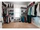 Spacious walk-in closet with ample shelving and hanging space for organized storage of clothes and accessories at 5916 Two Pines Trl, Wake Forest, NC 27587