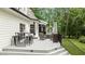 Outdoor deck area with barstool seating, lounge, and heaters provides an excellent entertaining space at 5916 Two Pines Trl, Wake Forest, NC 27587