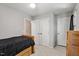 Spacious bedroom with plush carpet, closets, and a ceiling fan at 669 Tyler Run Dr, Wake Forest, NC 27587