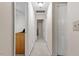 Hallway view with carpeted floors and access to multiple rooms at 669 Tyler Run Dr, Wake Forest, NC 27587