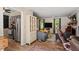 Open-concept area featuring a living room, office, and kitchen area with stainless steel appliances at 669 Tyler Run Dr, Wake Forest, NC 27587