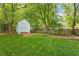 Backyard includes a storage shed providing extra outdoor space at 669 Tyler Run Dr, Wake Forest, NC 27587