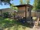 Backyard chicken coop with multiple nesting boxes and a secure enclosed area at 704 S Mineral Springs Rd, Durham, NC 27703
