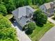 Beautiful home with stone accents, a two-car garage, and a well-manicured lawn at 713 Liberty Cliff Dr, Cary, NC 27519