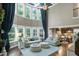 The living room is spacious and well-lit, with high ceilings and seamless transition to the kitchen at 713 Liberty Cliff Dr, Cary, NC 27519
