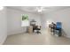 Versatile bedroom featuring a large window and ample space for a home office setup at 725-727 Locust Ln, Raleigh, NC 27603