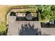 Aerial view of a fenced-in patio with outdoor seating, a colorful rug, and a lovely backyard at 7918 Yester Ct, Raleigh, NC 27615