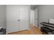 Bedroom with a closet and a musical keyboard at 7918 Yester Ct, Raleigh, NC 27615
